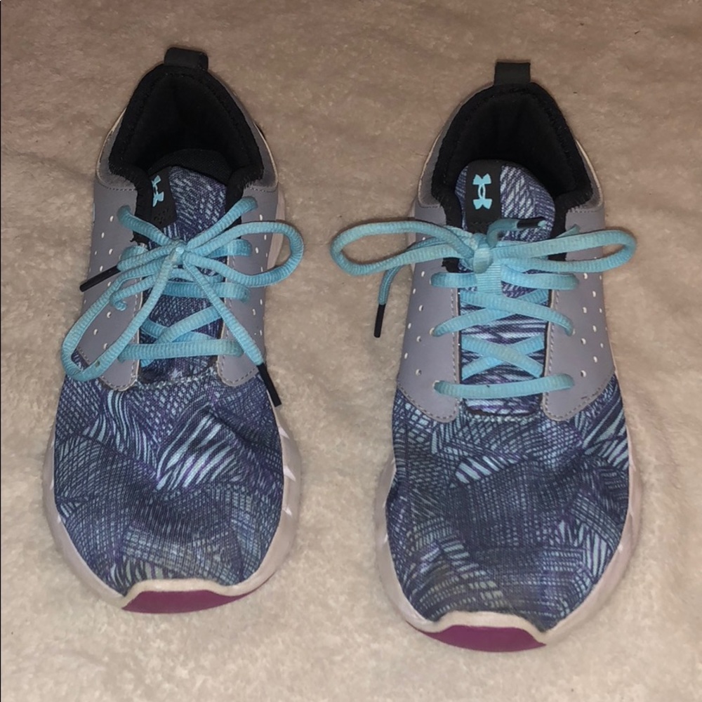 Blue and gray Under Armour running shoes